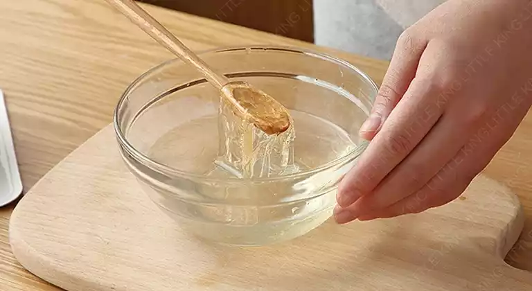 Gelatin sheet is soaked in cold water and becomes softened.